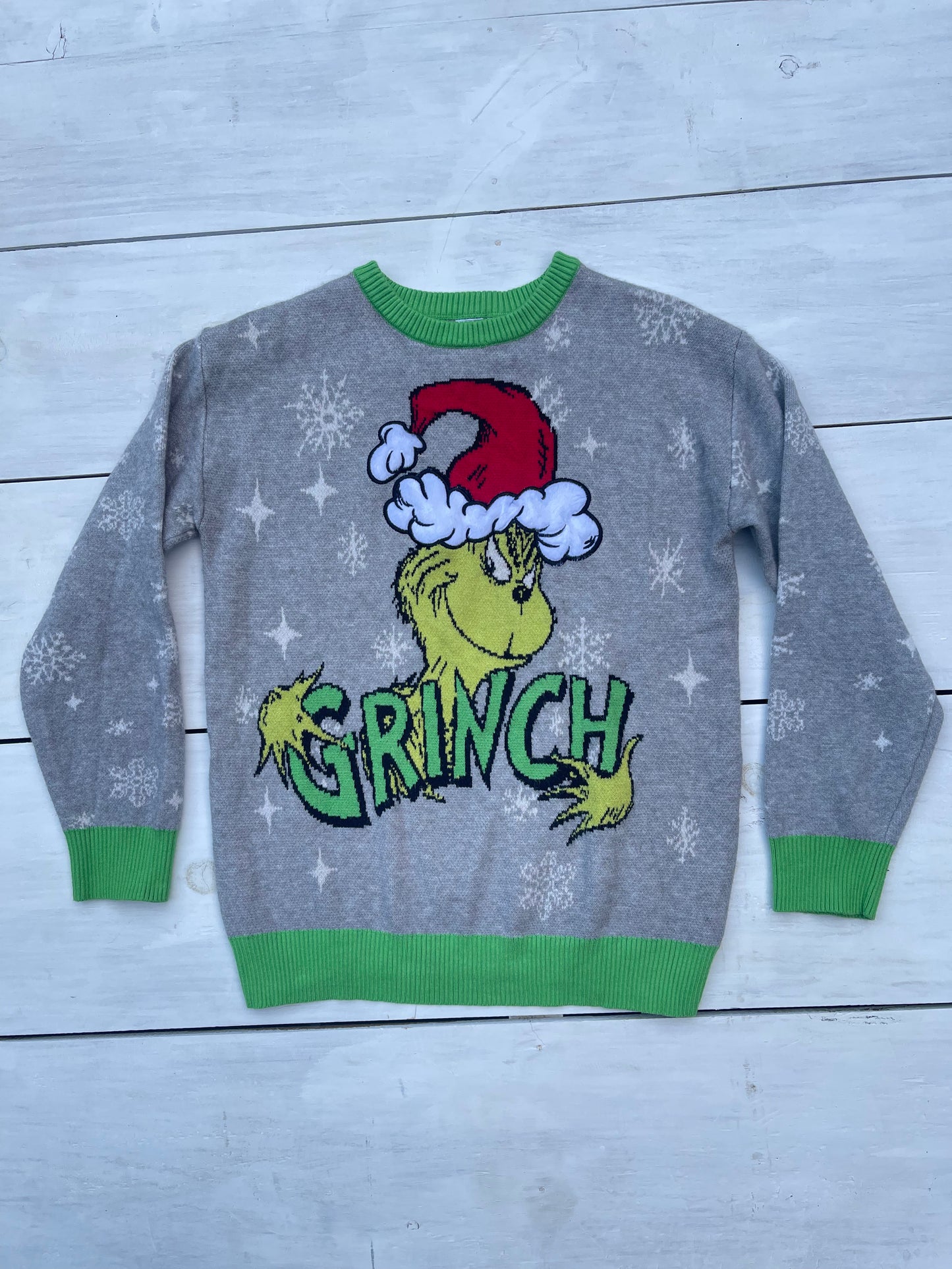 Suéter Grinch talla 14–16 años